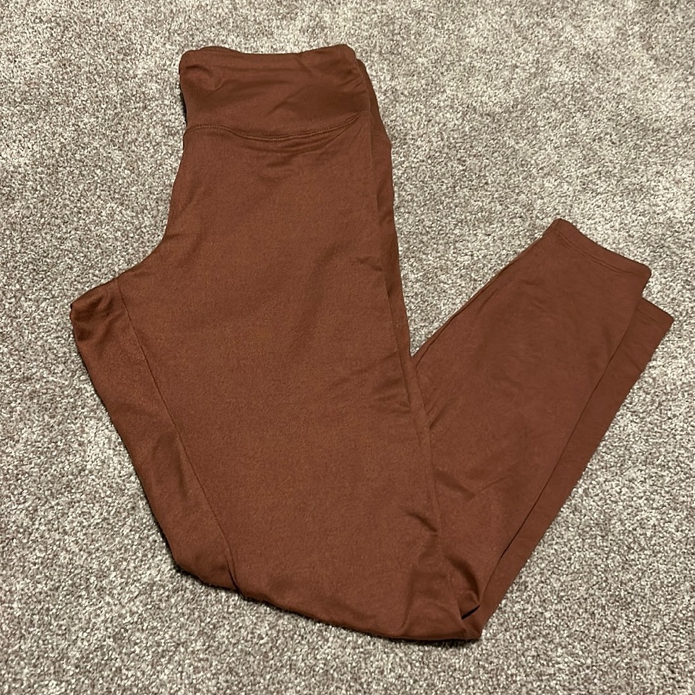 Rose gold/blush/taupe pink colored leggings from Express One Eleven collection.